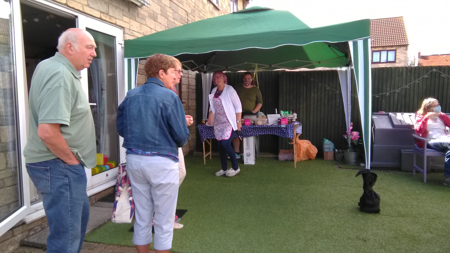 Friends visit cake stall