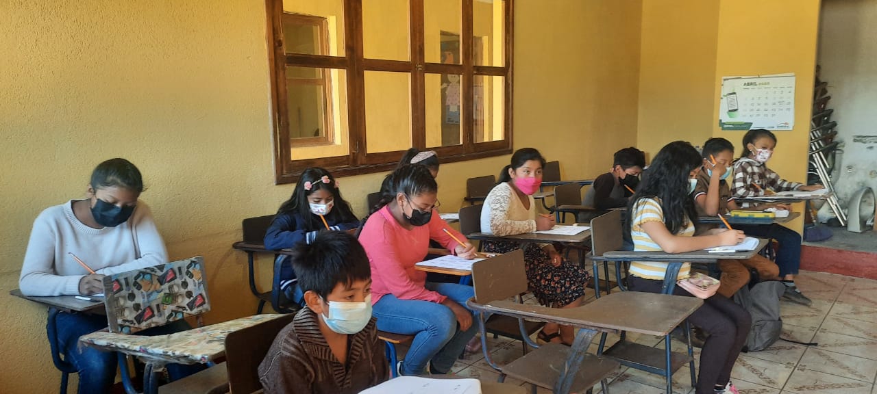 Small yellow school room in Alotenango Guatemala