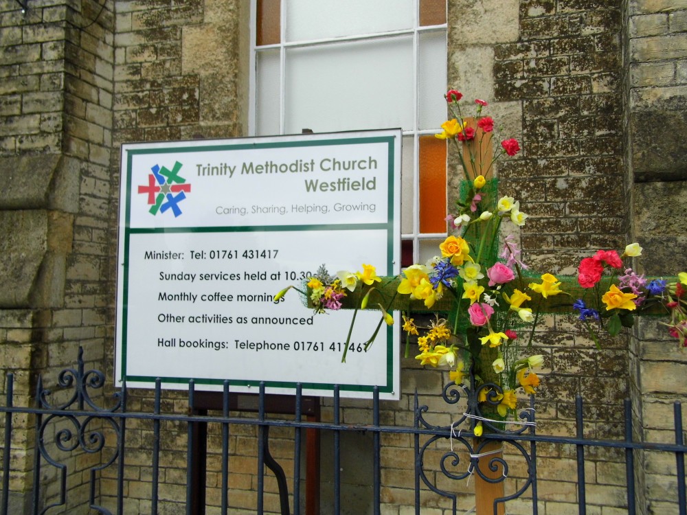 Floral Cross at Easter outside Trinity Westfield Methodist